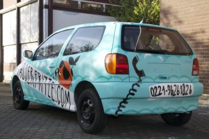 Proffessionelle Graffiti-Sprayer-Gestaltung eines VW Polos in Köln.